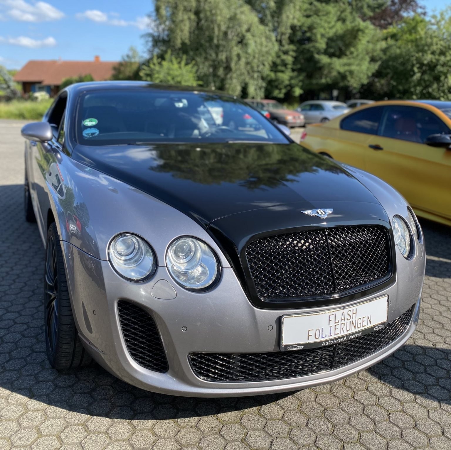 Bentley Continental GT mit schwarzer Teilfolierung an Motorhaube, Dach und Grill